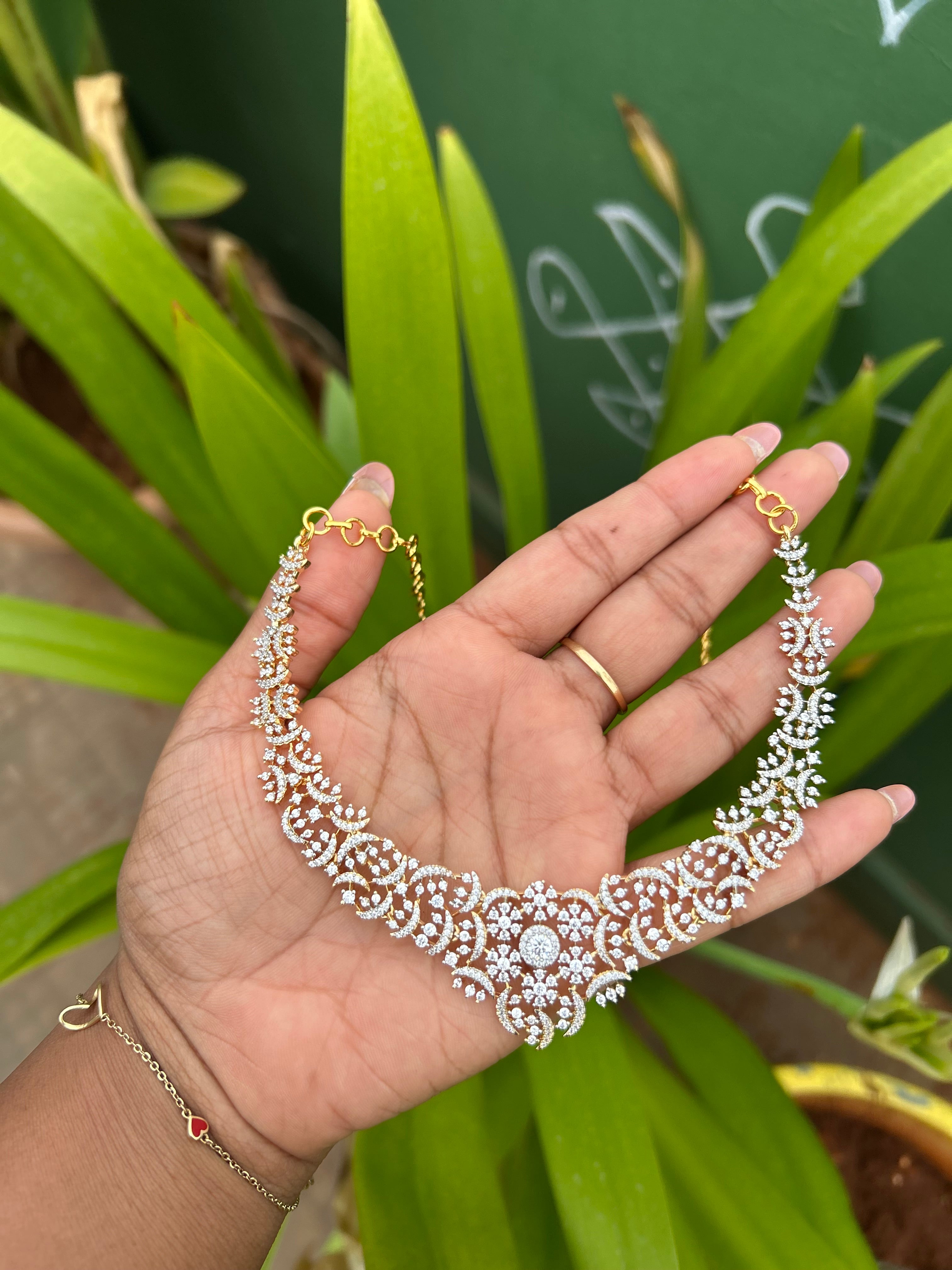 Aksha ( A premium diamond look a like) neckset