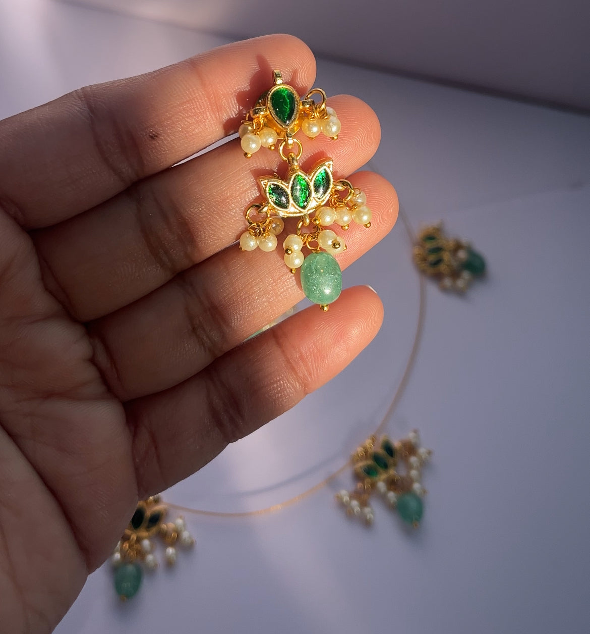 Invisible lotus green kundan neck set