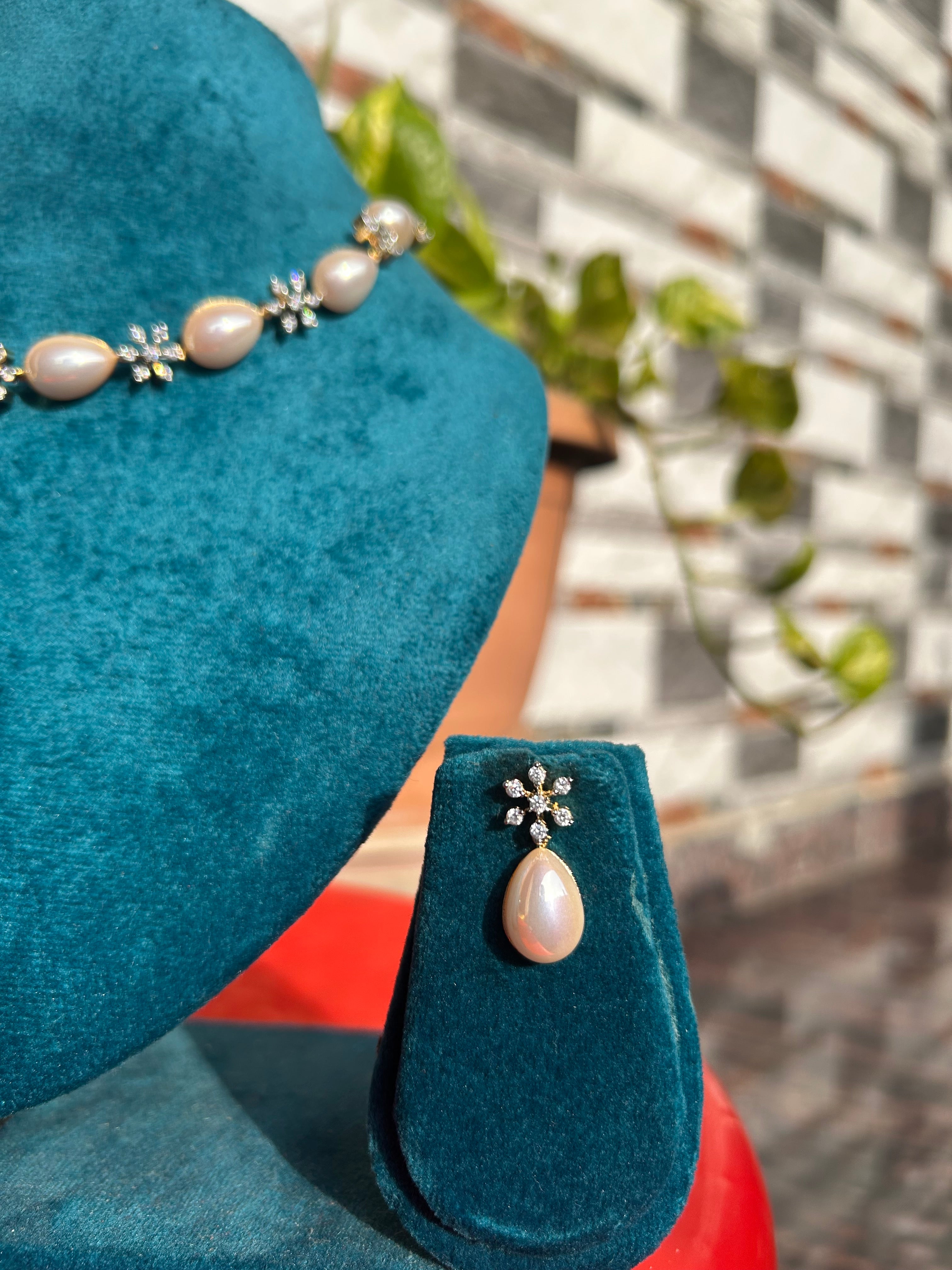 Vasavi (Mother of Pearl)