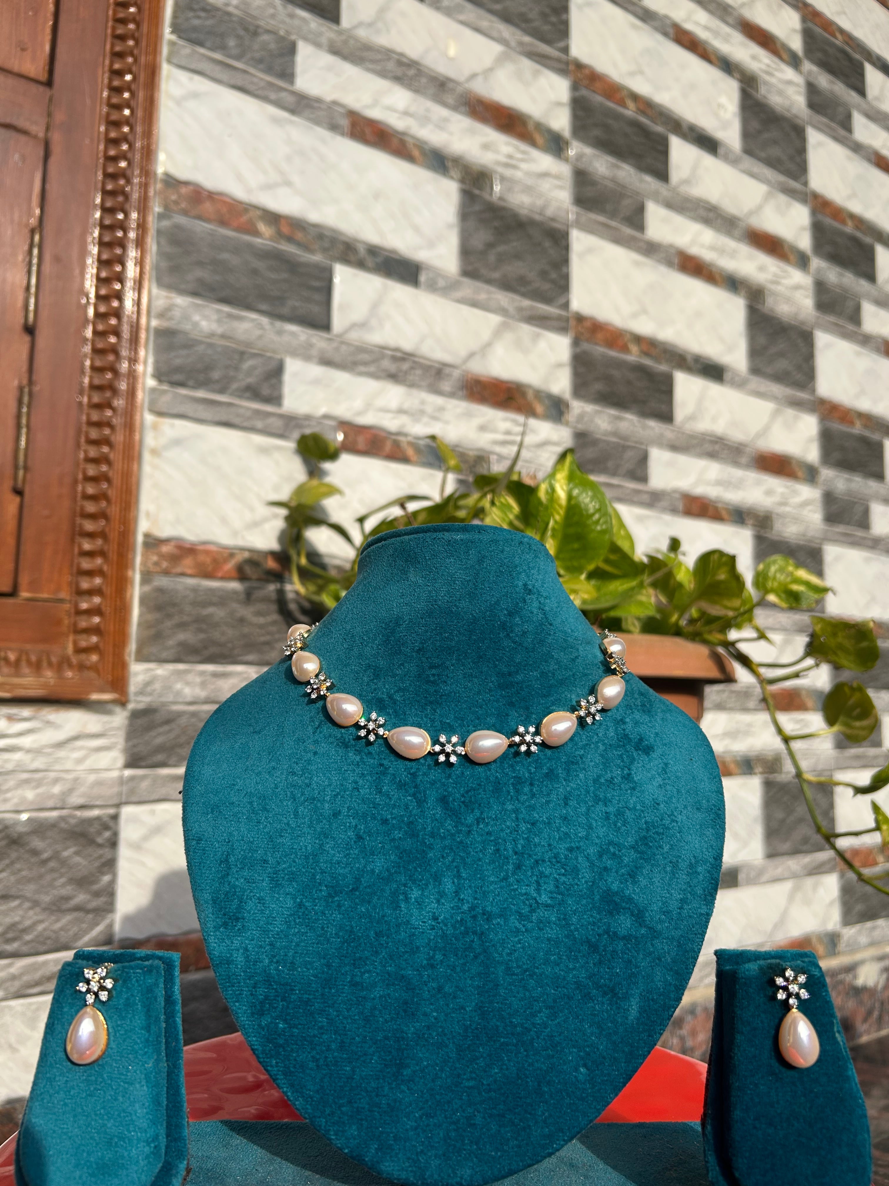 Vasavi (Mother of Pearl)