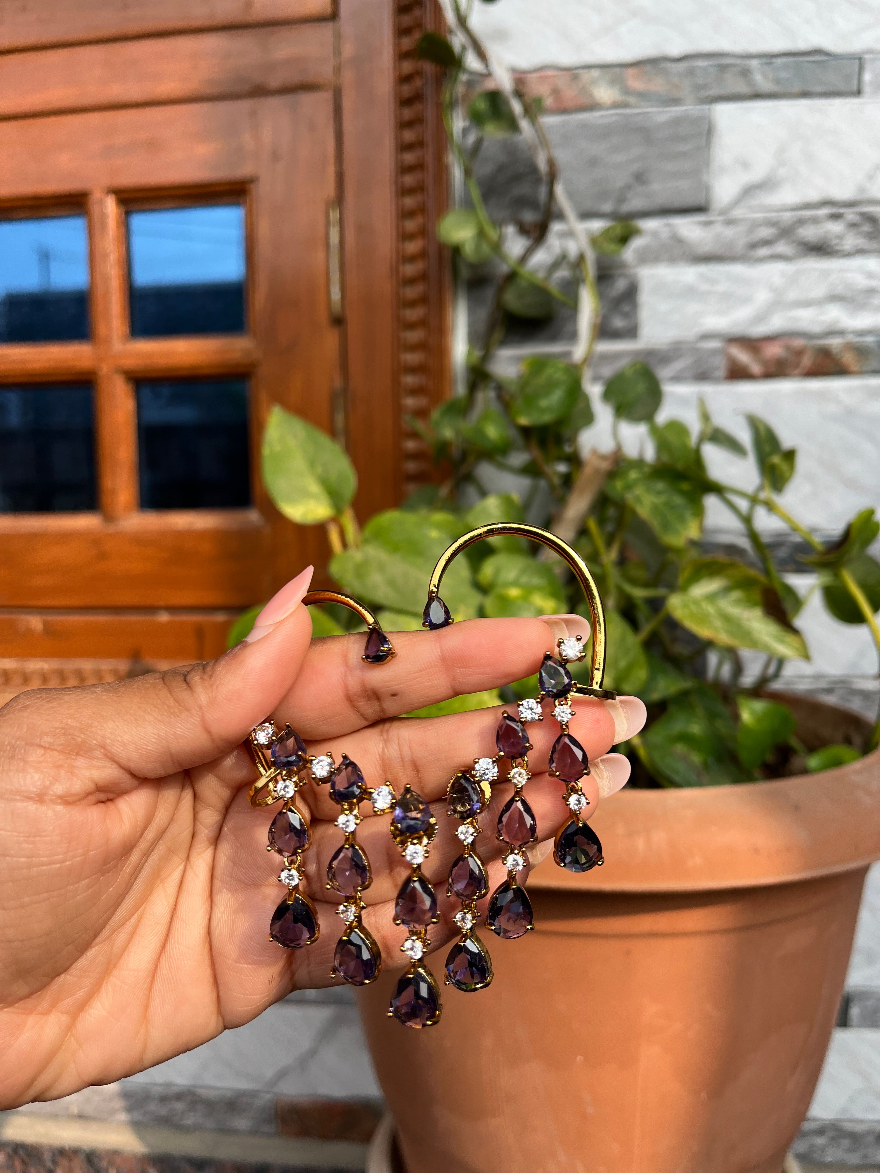 Purple statement earrings