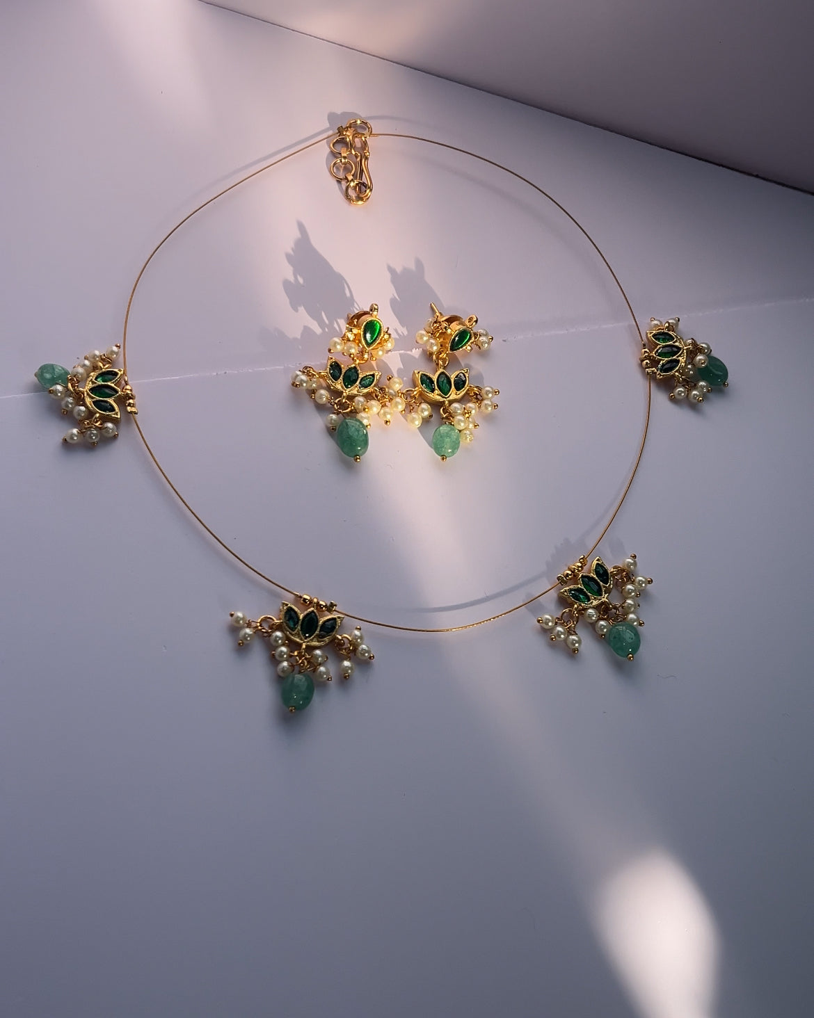 Invisible lotus green kundan neck set